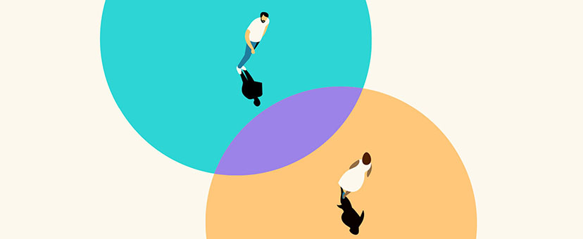 Illustration of a man and a woman standing in separate-colored circles with an overlap of another color in between them Illustration of a man and a woman standing in separate-colored circles with an overlap of another color in between them